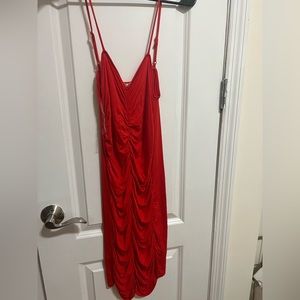 Red ruched midi dress